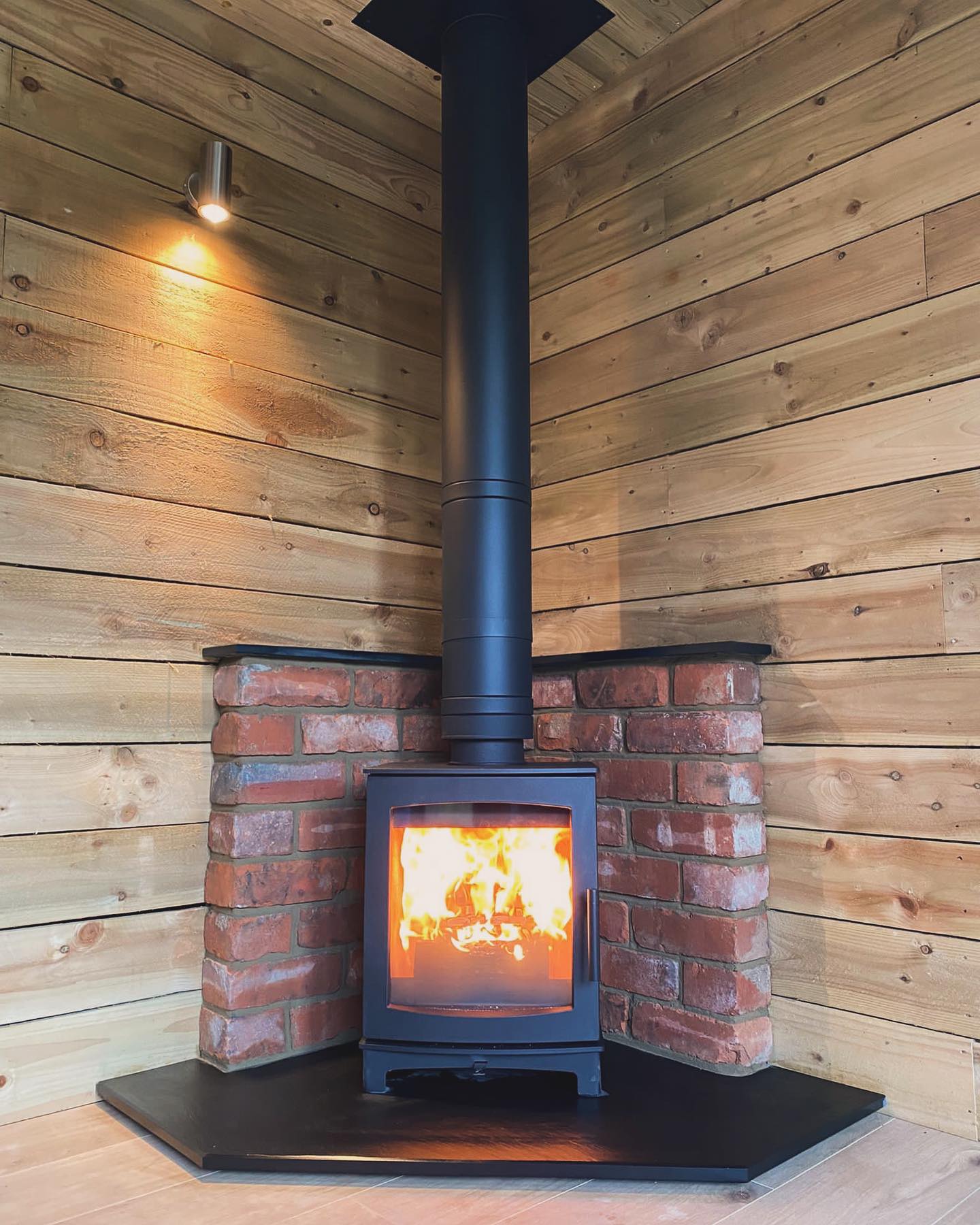 Wood Burning Stove Installation in Timber Garden Room view 2