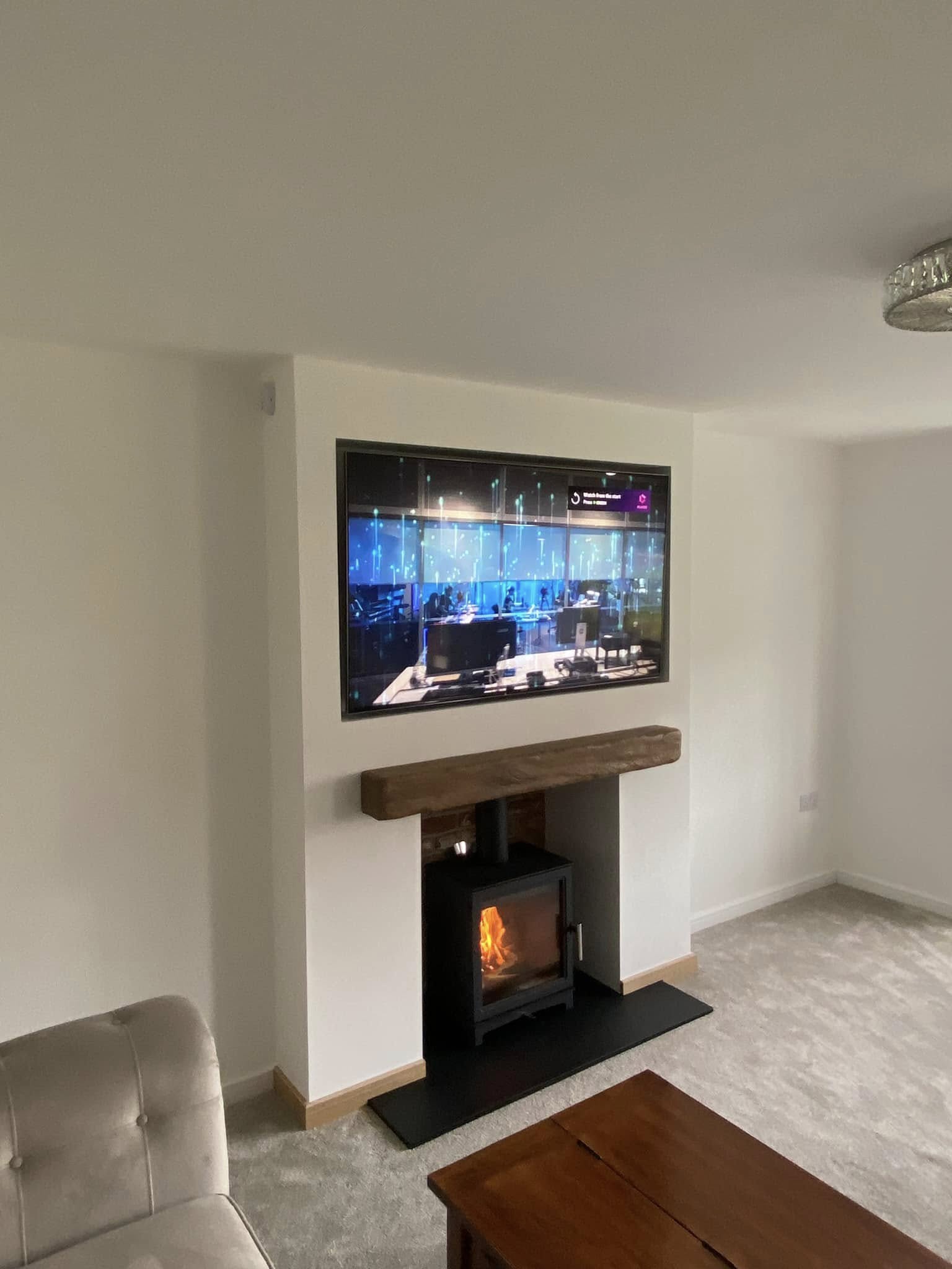Feature Chimney Breast with Wood Burning Stove and Inset TV view 4