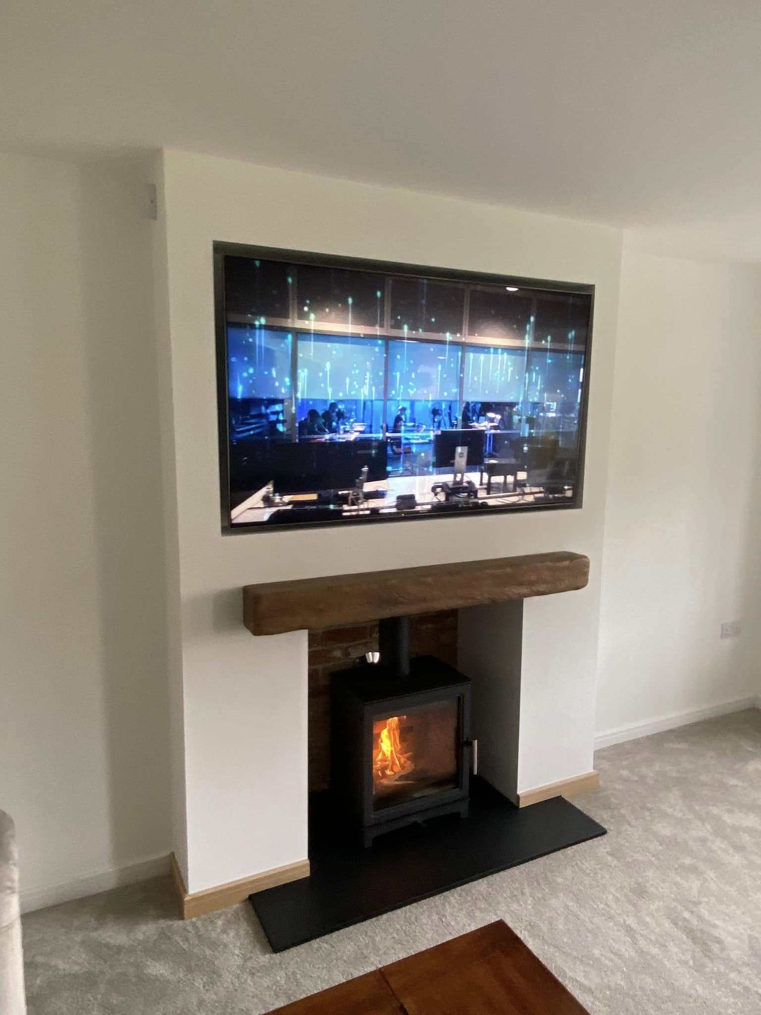 Feature Chimney Breast with Wood Burning Stove and Inset TV view 6