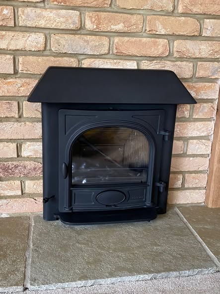 Newbiggin Fireplace with Tiled Hearth and Original Brickwork