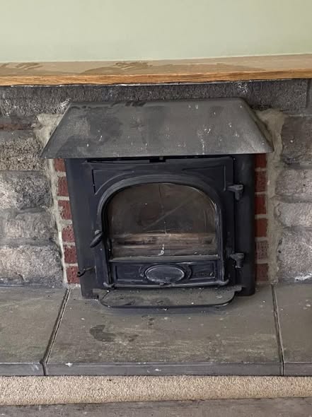Newbiggin Fireplace with Tiled Hearth and Original Brickwork