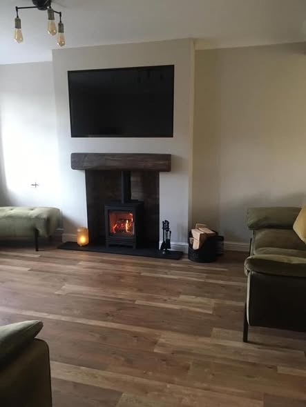 Flat Wall Transformed with Stove and Inset TV view 5