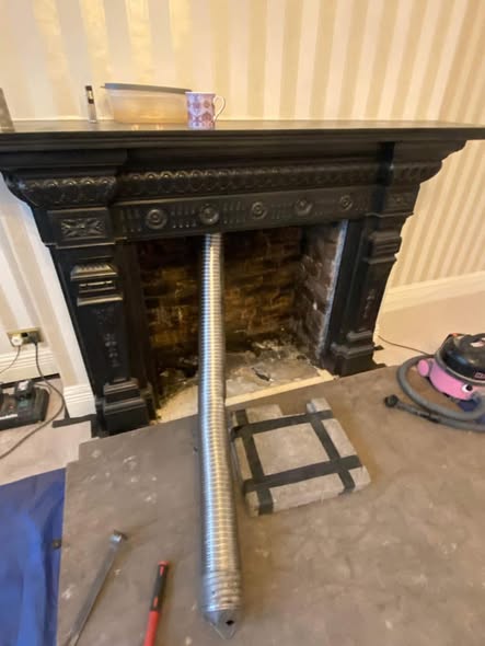 Steel-Framed Chimney Breast with Stove and Inset TV