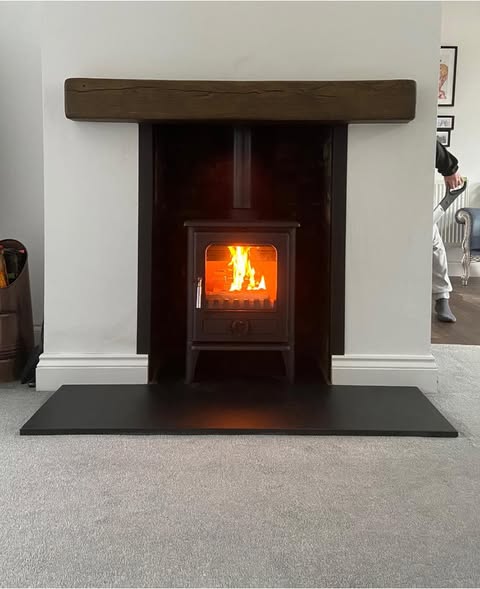 Opened Chimney Breast with Original Brickwork and Stove view 2