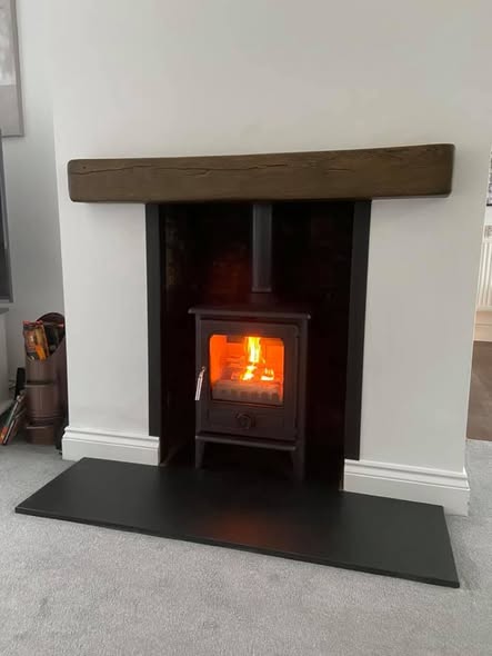 Opened Chimney Breast with Original Brickwork and Stove view 5