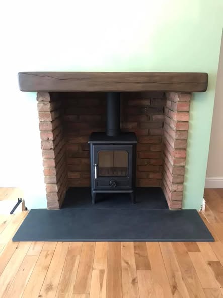 Jetmaster Inset Stove with Brick Slip Feature Wall