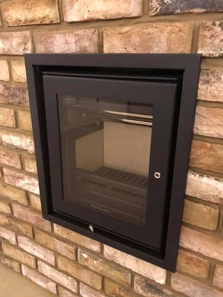 Jetmaster Inset Stove with Brick Slip Feature Wall