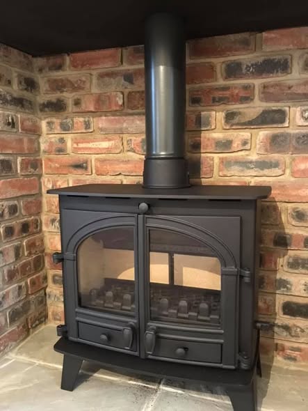 Jetmaster Inset Stove with Brick Slip Feature Wall