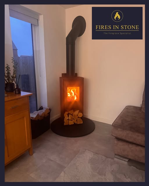 Garden room corner stove with brick slip detail